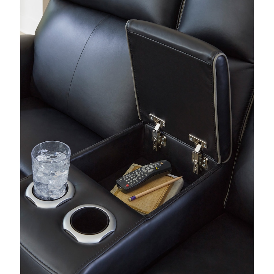 a black leather loveseat   