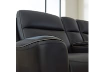 a black leather loveseat   