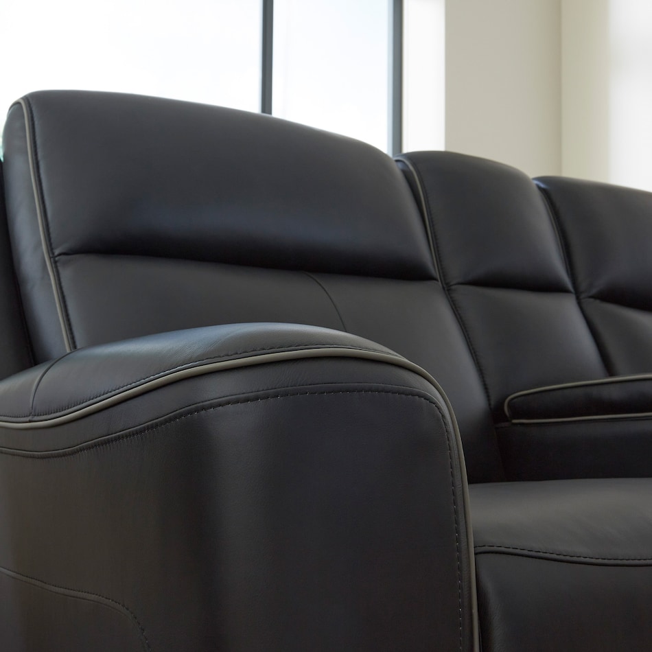 a black leather loveseat   