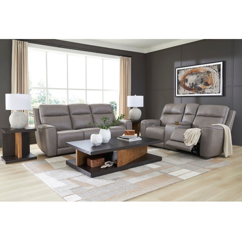a gray leather loveseat   