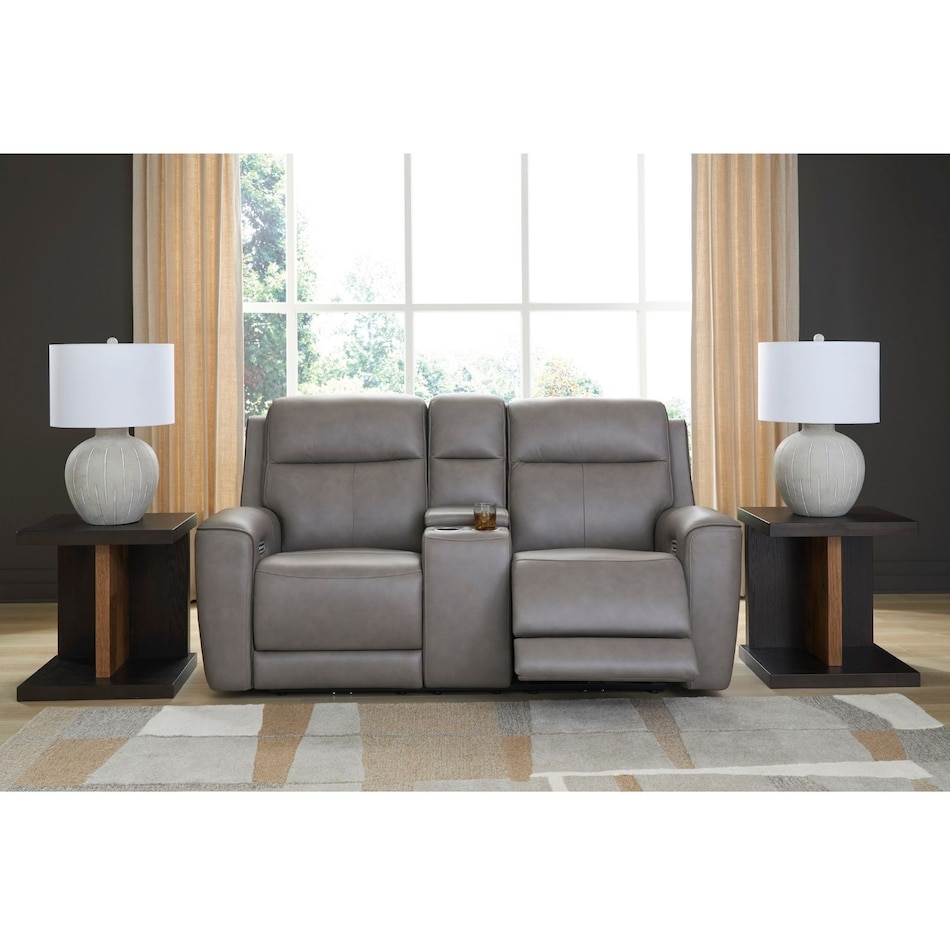 a gray leather loveseat   
