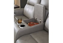a gray leather loveseat   