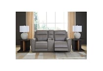 a gray leather loveseat   