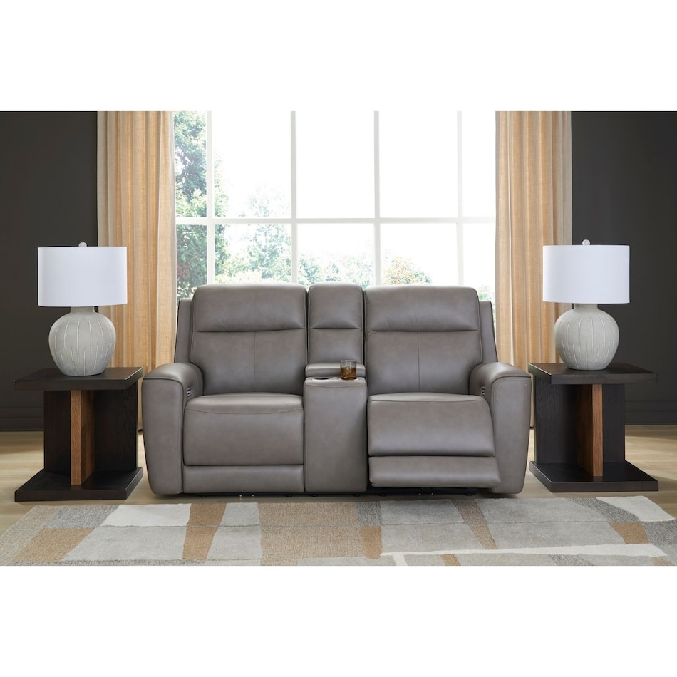 a gray leather loveseat   