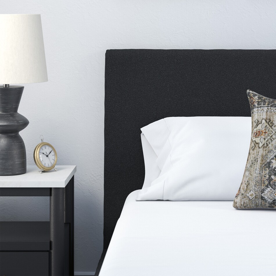 a black uph headboard   