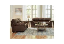 a brown fab loveseat   