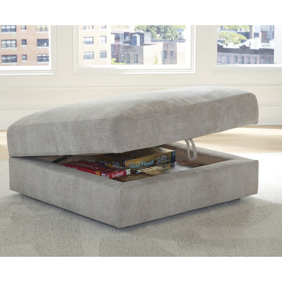 a beige fabric ottoman   