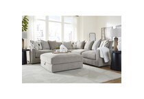 a beige fabric ottoman   