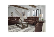 a brown fabric loveseat   