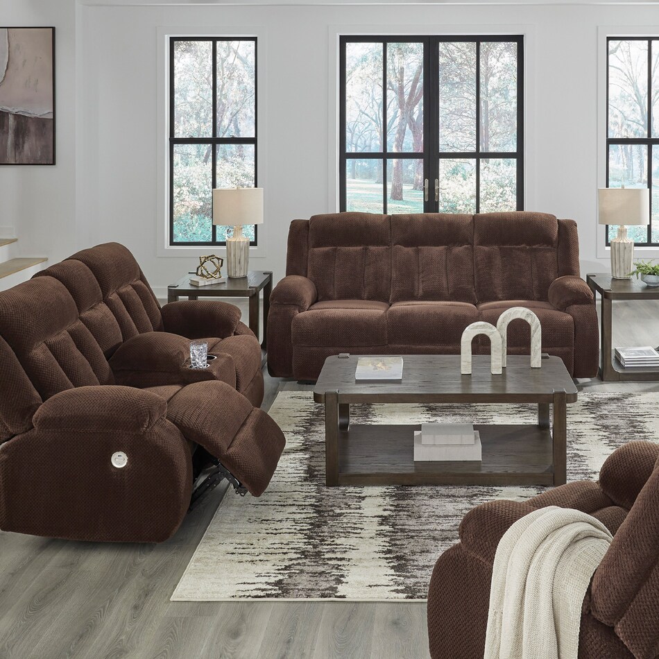 a brown fabric loveseat   