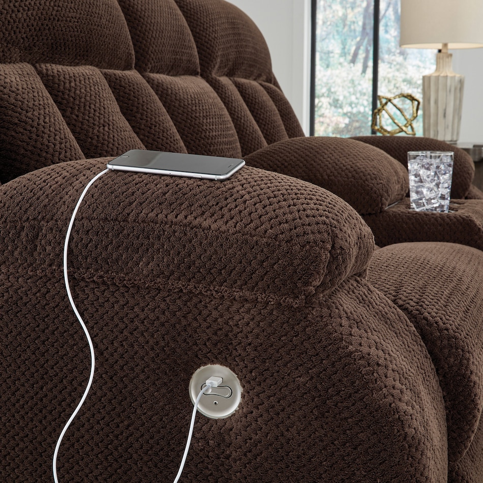 a brown fabric loveseat   