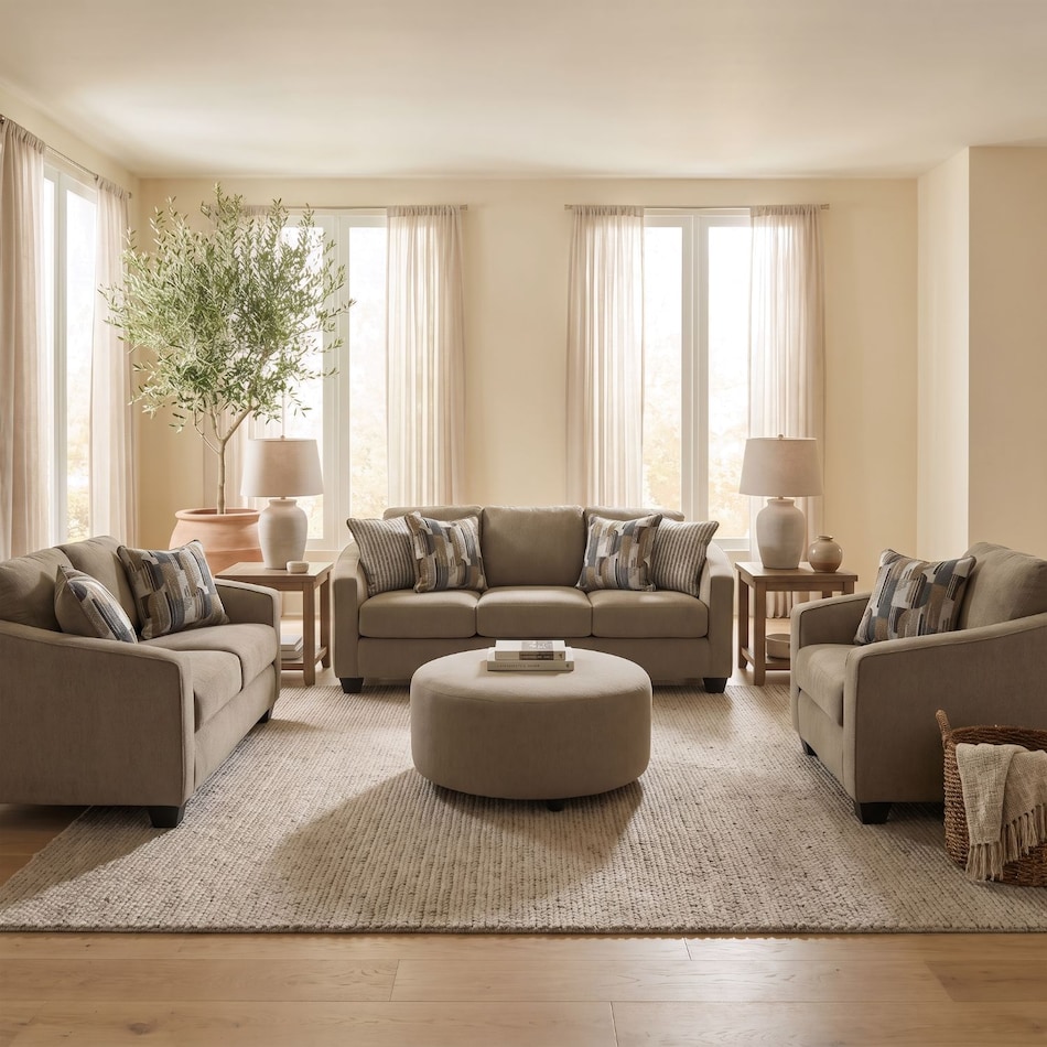 a tan fabric sofa   