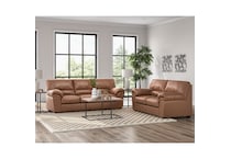 a brown fab loveseat   