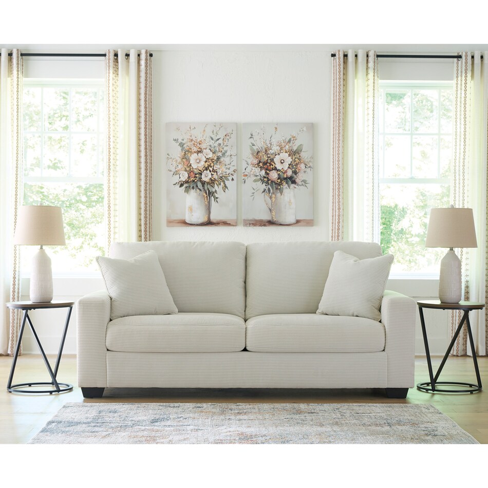 a white fab sofa   