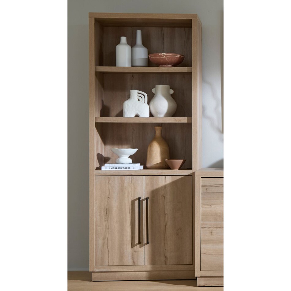 a light brown bookcase   