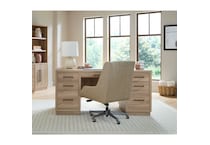 a light brown computer desk   