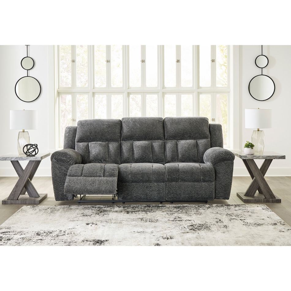 a gray fabric sofa   