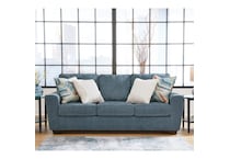 a blue fabric sofa   