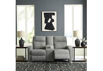 a gray fabric loveseat   