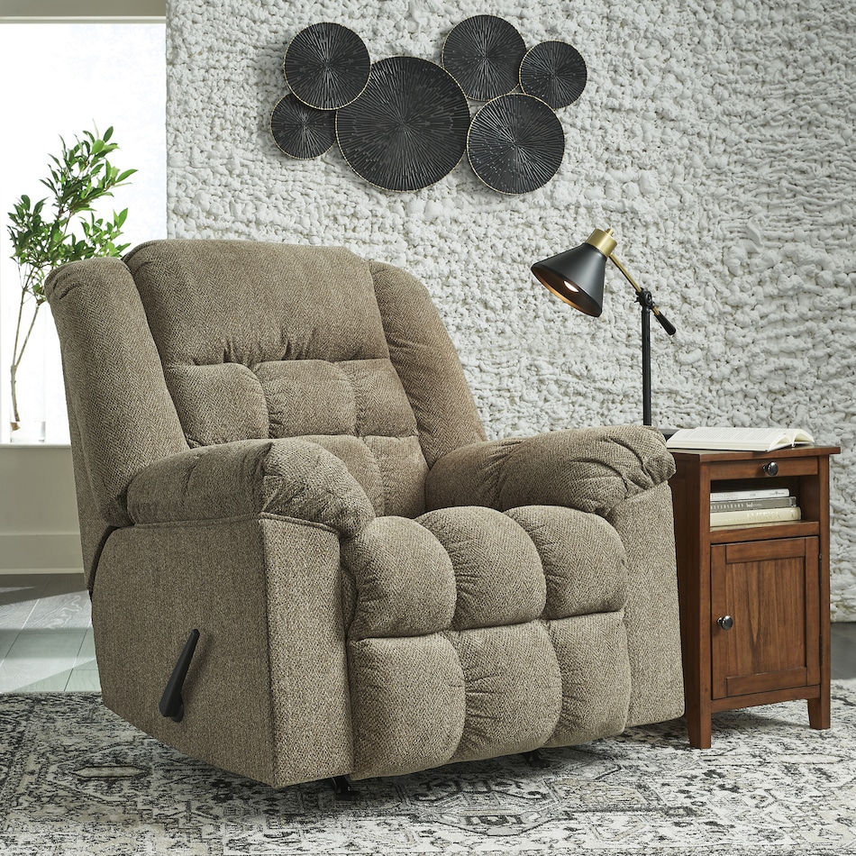 a beige fabric recliner   