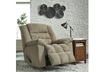 a beige fabric recliner   