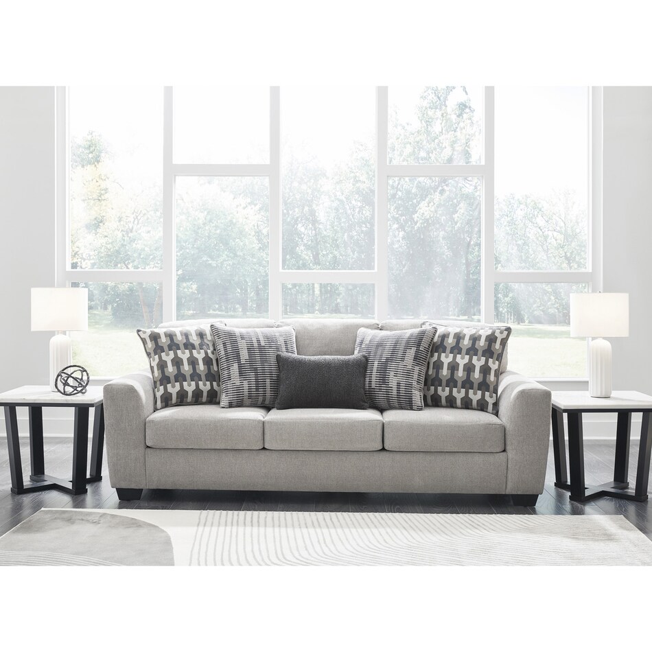 a gray fabric sofa   