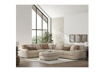 a beige fabric ottoman   