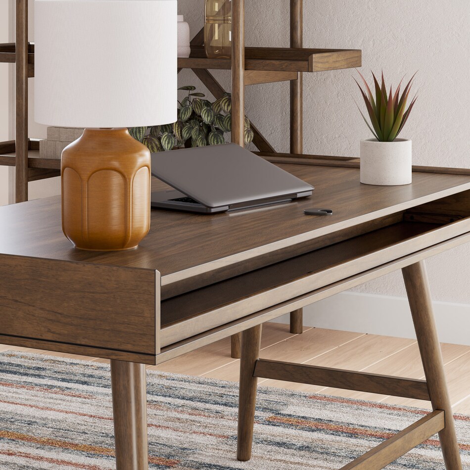 a brown computer desk   