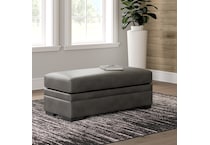 a gray fabric ottoman   