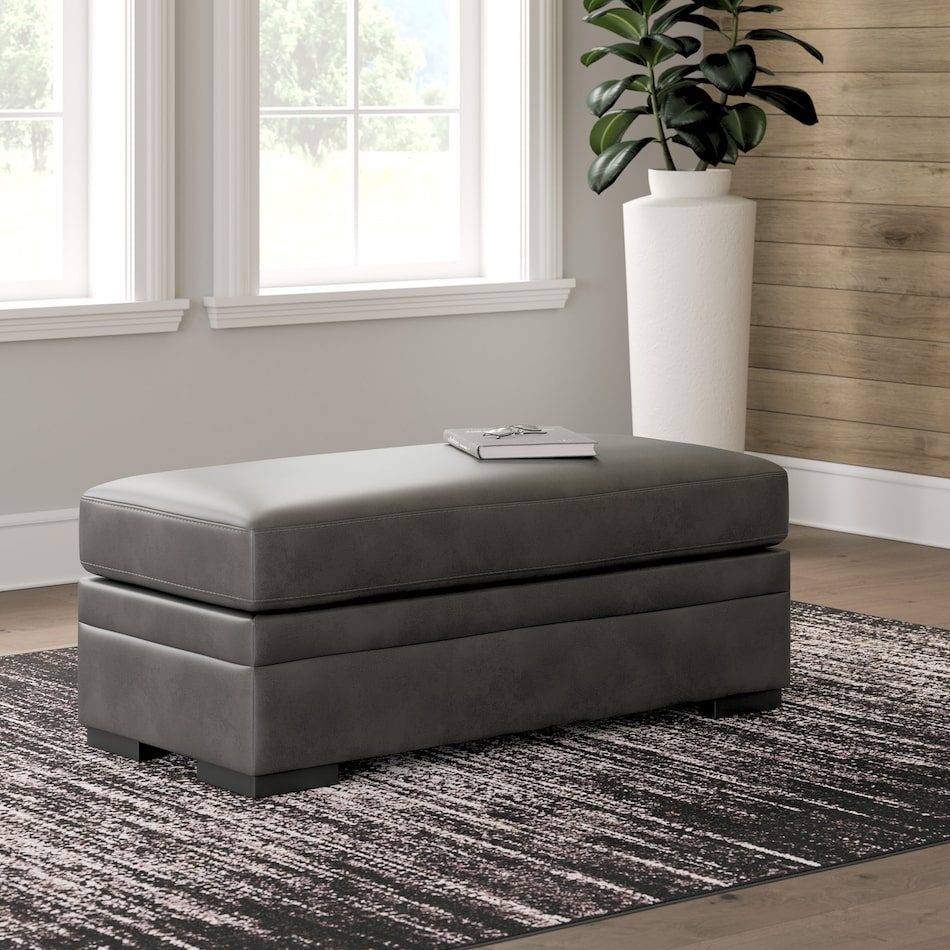 a gray fabric ottoman   