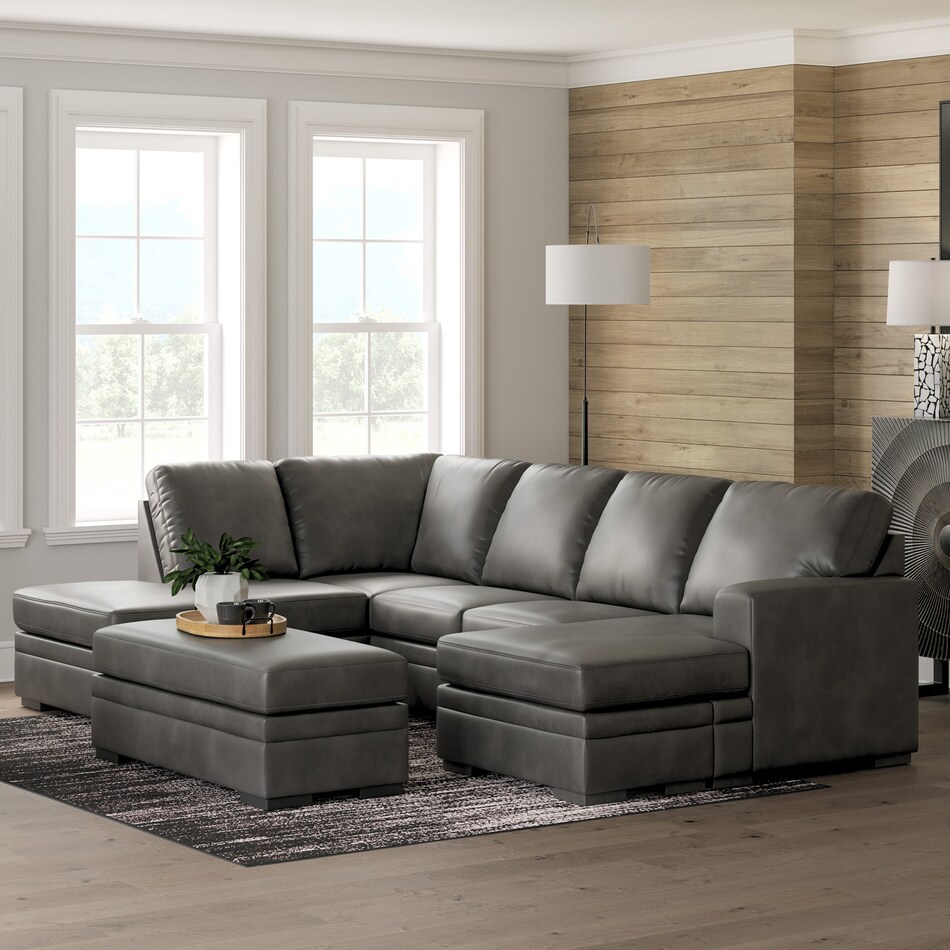 a gray fabric ottoman   