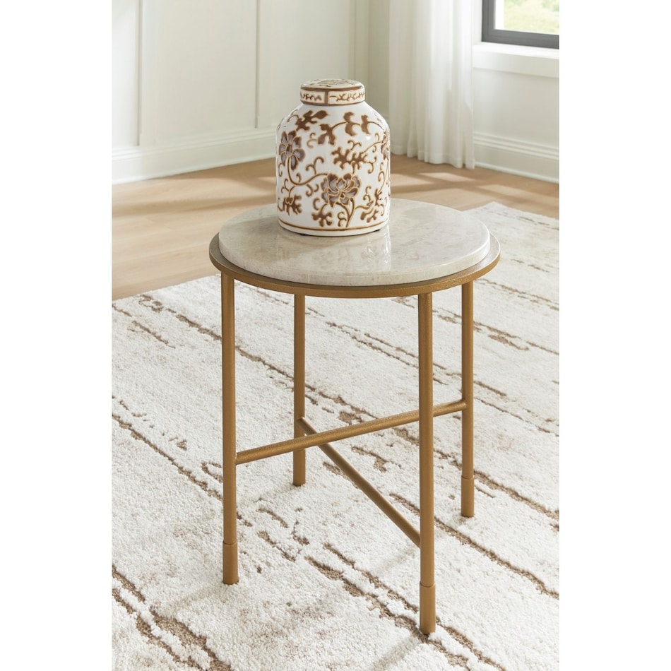 at antiqued goldtone cocktail table   