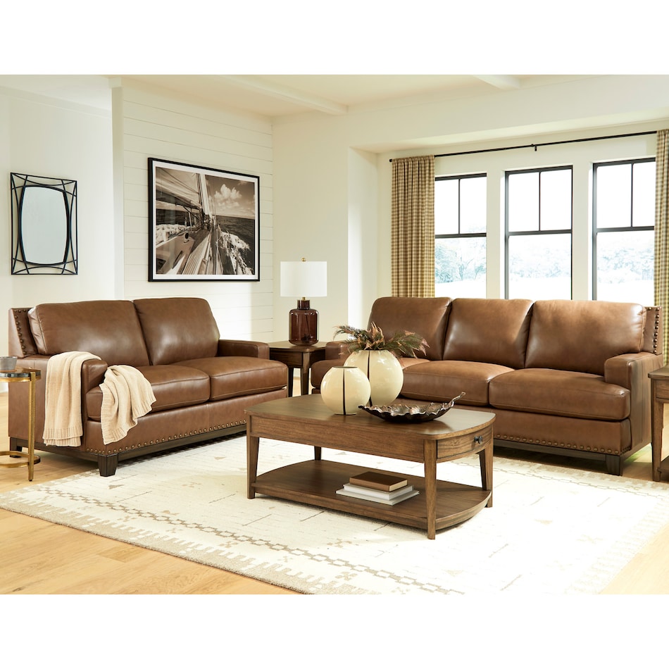 a brown leathermatch loveseat   