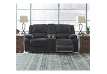 a gray fabric loveseat   