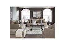 a white fabric loveseat   
