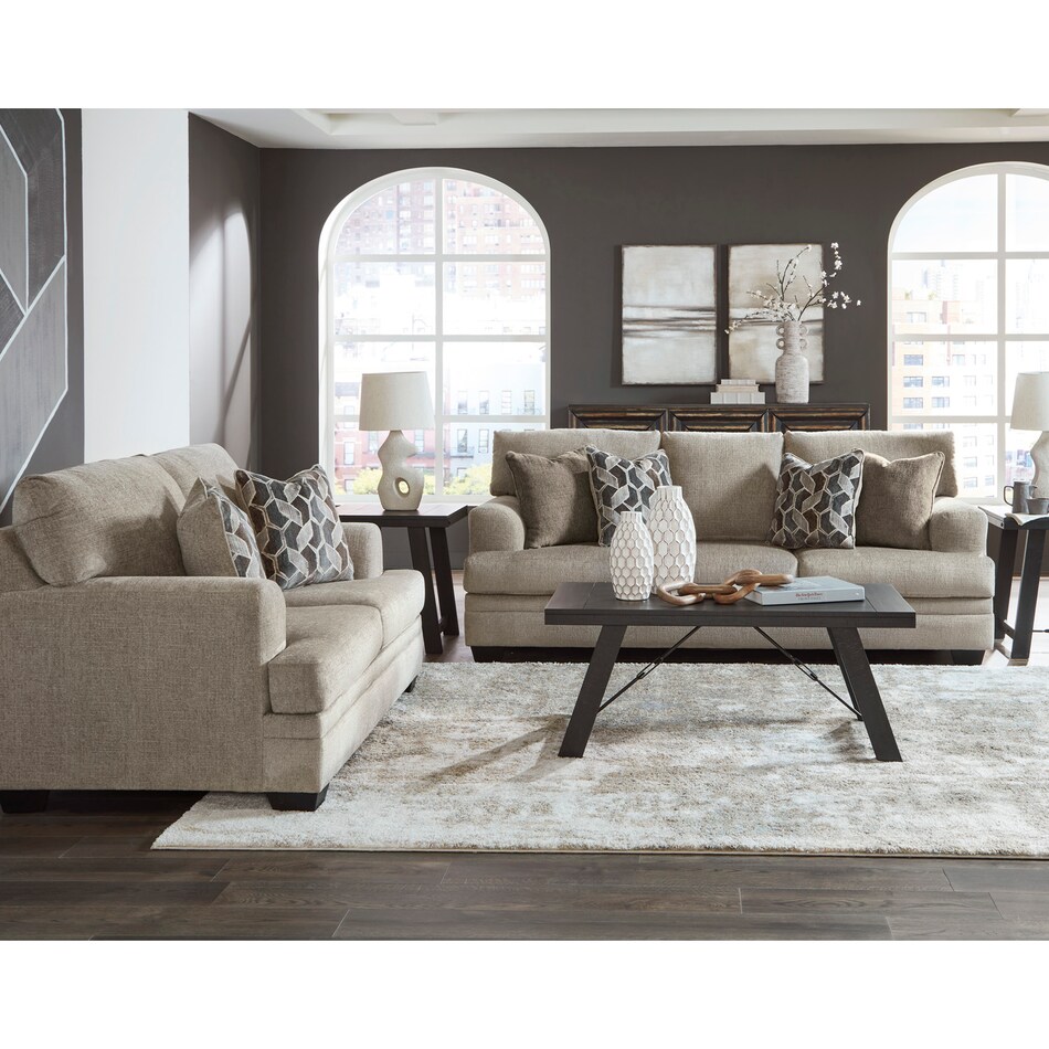 a white fabric sofa   