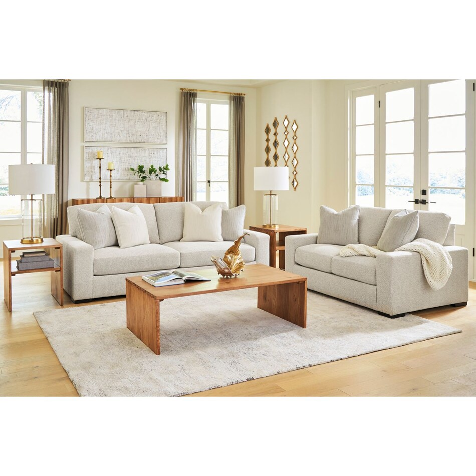a white fabric sofa   