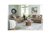 a brown fabric loveseat   