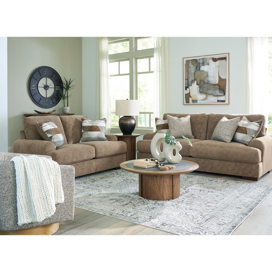 a brown fabric loveseat   