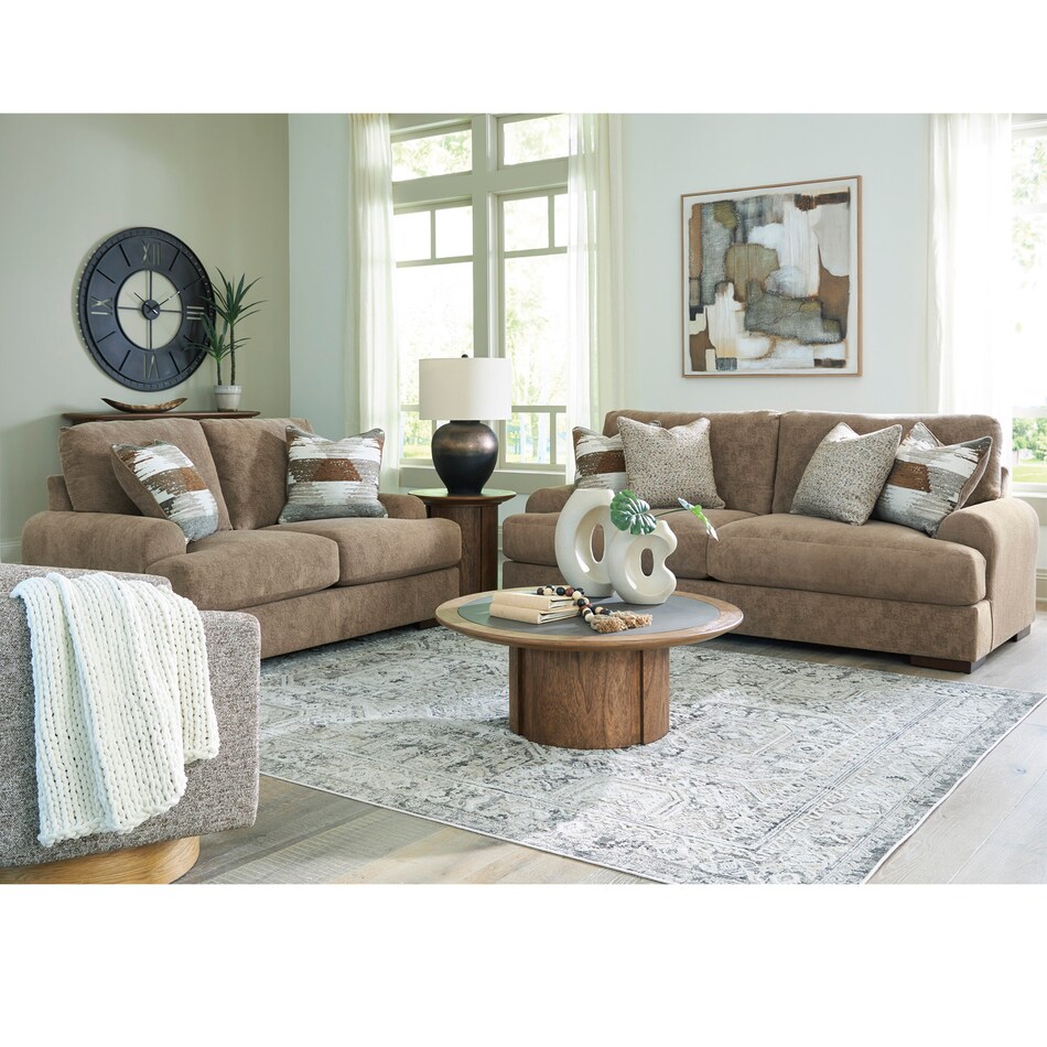 a brown fabric sofa   