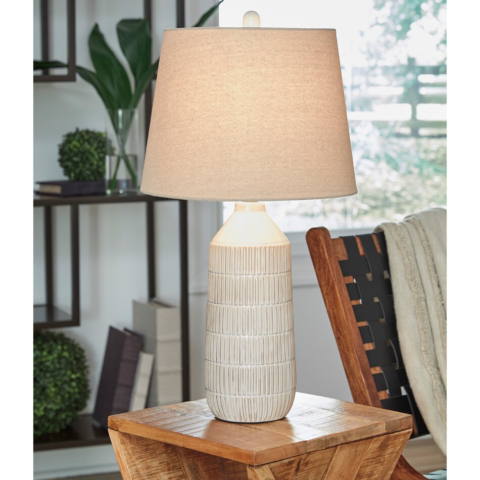 a white ceramic glass lamp   