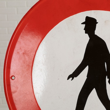Antique Guy In Circle Sign
